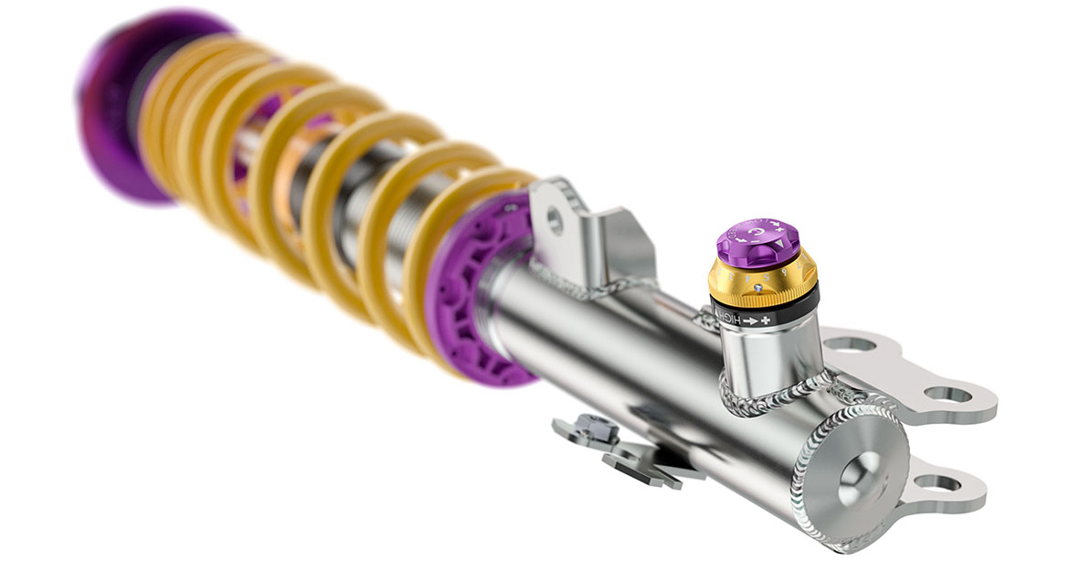 In other KW Clubsport 3-way coilovers, the compression in the low-speed and high-speed ranges are typically adjusted via the valves in the compensating reservoir; however, in the Clubsport suspension for the GR Yaris, the adjustment is integrated directly into the strut and damper.